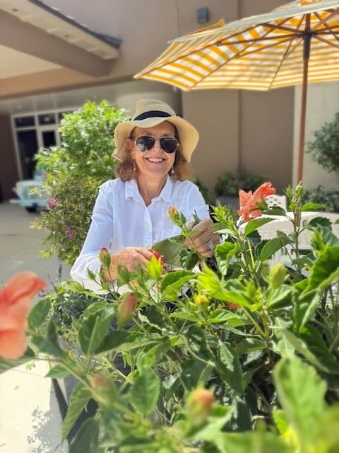 Beth tending to a garden